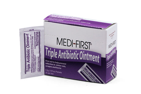 Packaging of MEDI-FIRST Triple Antibiotic Ointment, showing a box and a single packet with product information.